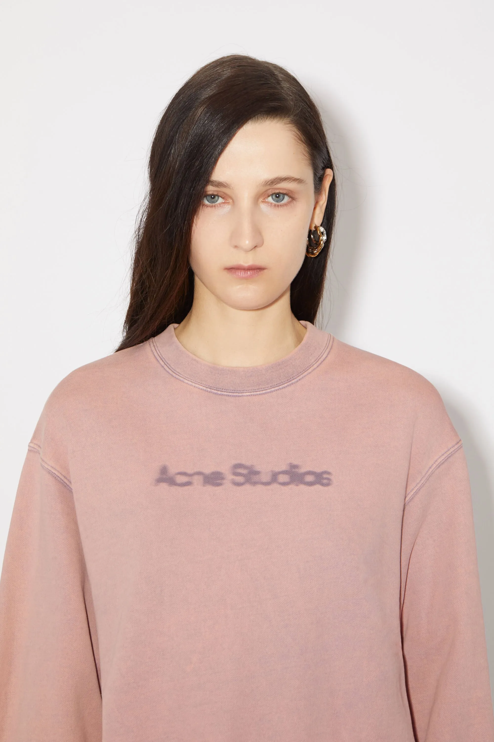 Blurred logo sweater