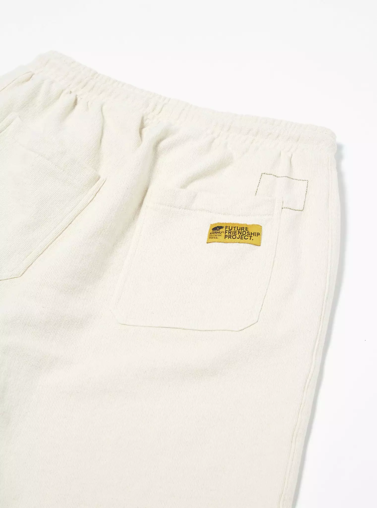 KARHU x UNIVERSAL WORKS Track Shorts Écru