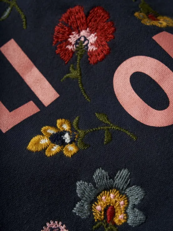 Sweater with flower embroidery