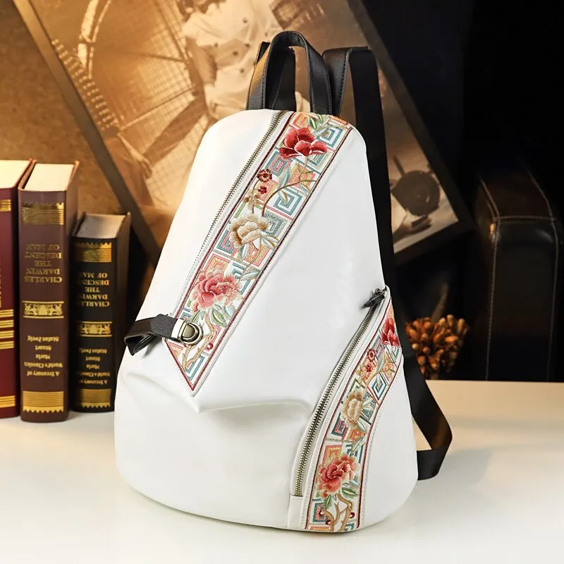 Unisex Retro Genuine Leather Embroidered Anti Theft Travel Backpack